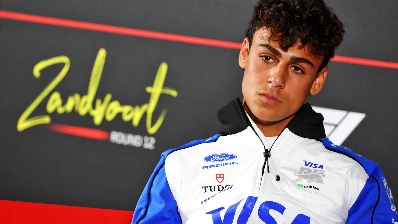 Arvid Lindblad expresses frustration over an extreme penalty during the Dutch Grand Prix