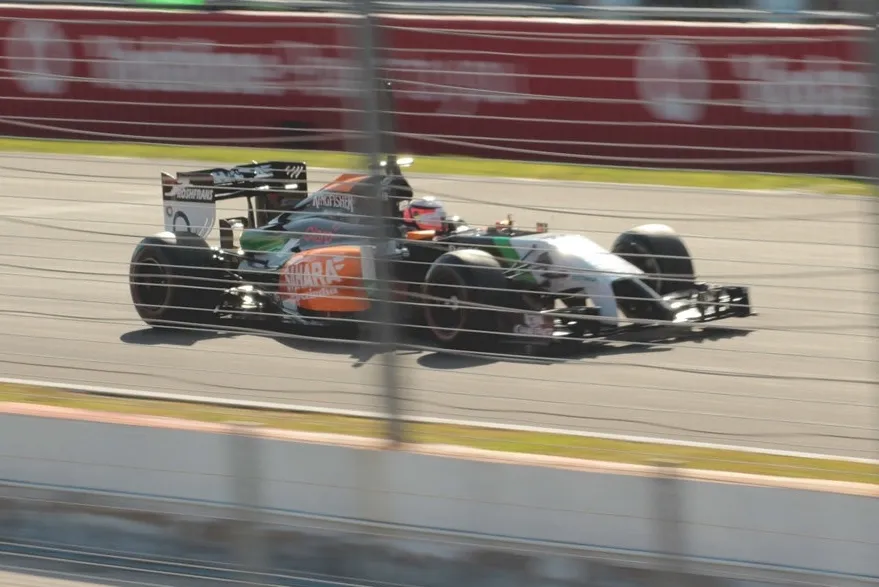 Force India Formula One racing car displaying competitive pace on track during a Grand Prix weekend