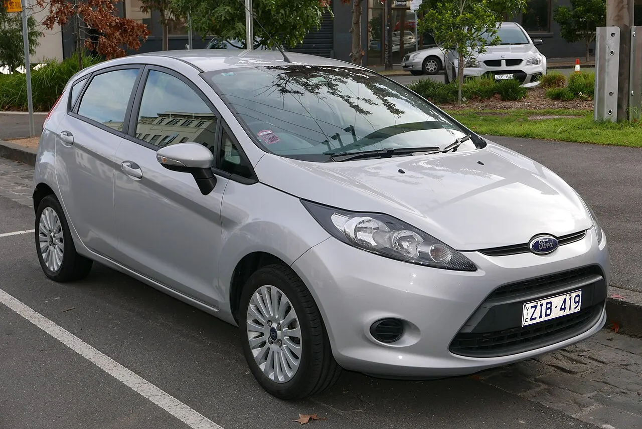 Ford Fiesta sixth generation parked on a scenic road representing global automotive design