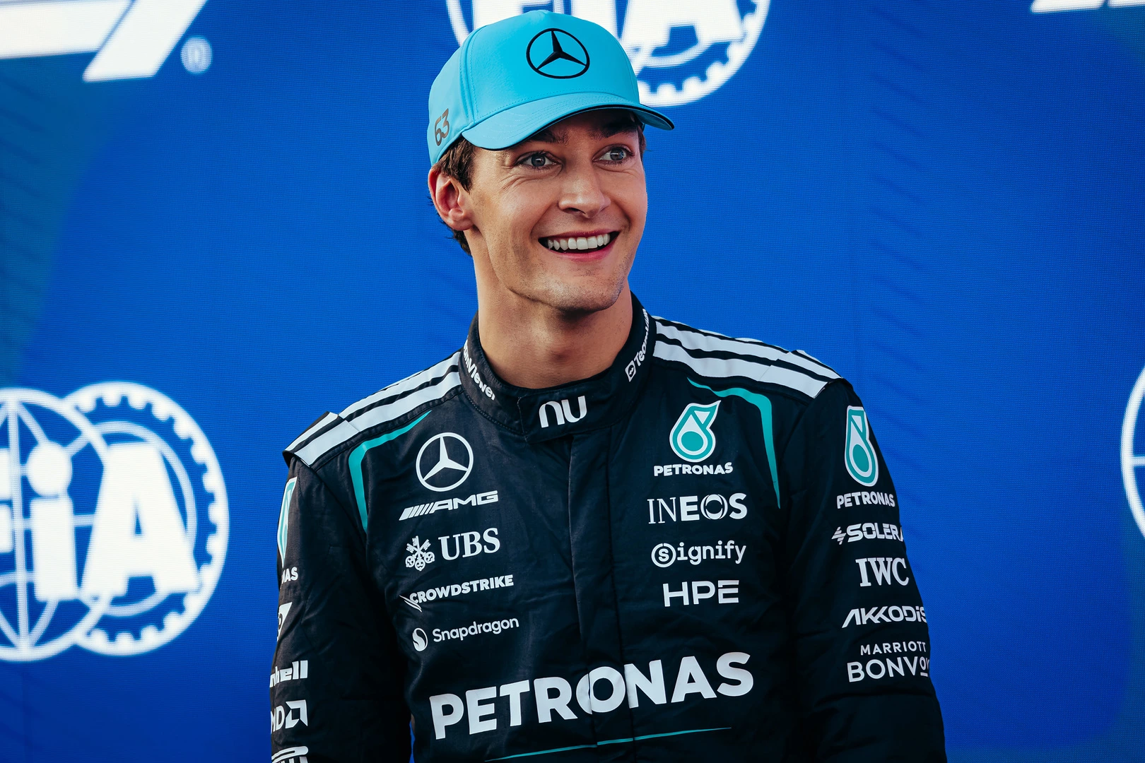 George Russell celebrates securing pole position for the Azerbaijan Grand Prix in Baku