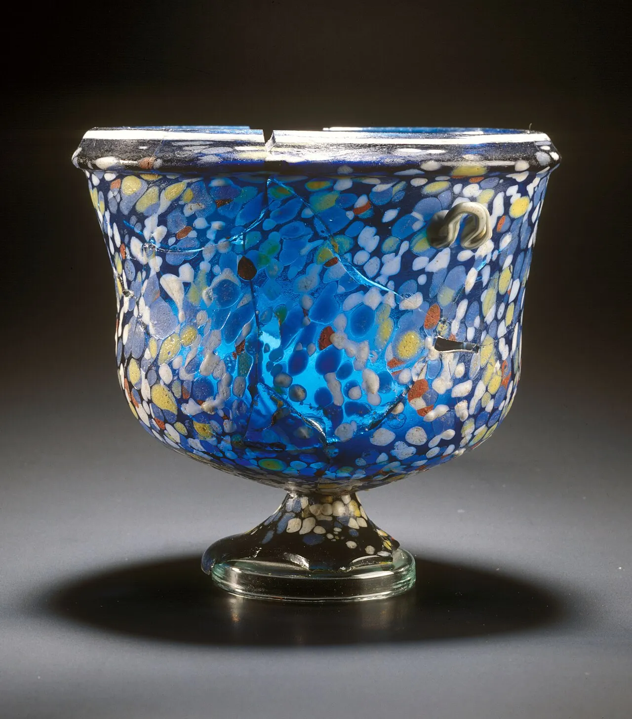 Stunning contemporary glass sculpture displayed in a modern art museum showcasing intricate design and craftsmanship