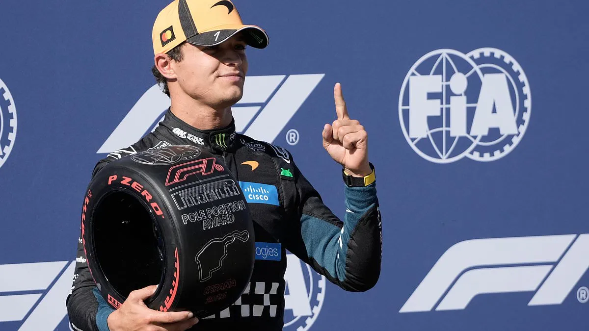 Lando Norris celebrates capturing pole position at the Spanish Grand Prix in Madrid