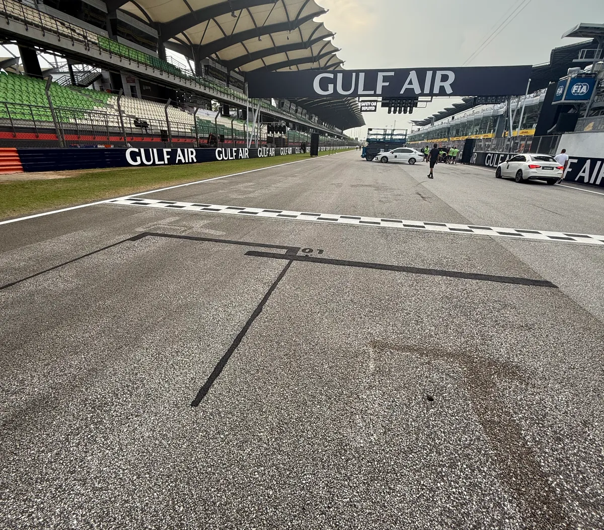Formula 1 officials implement last-minute grid repainting fix at the Sepang circuit
