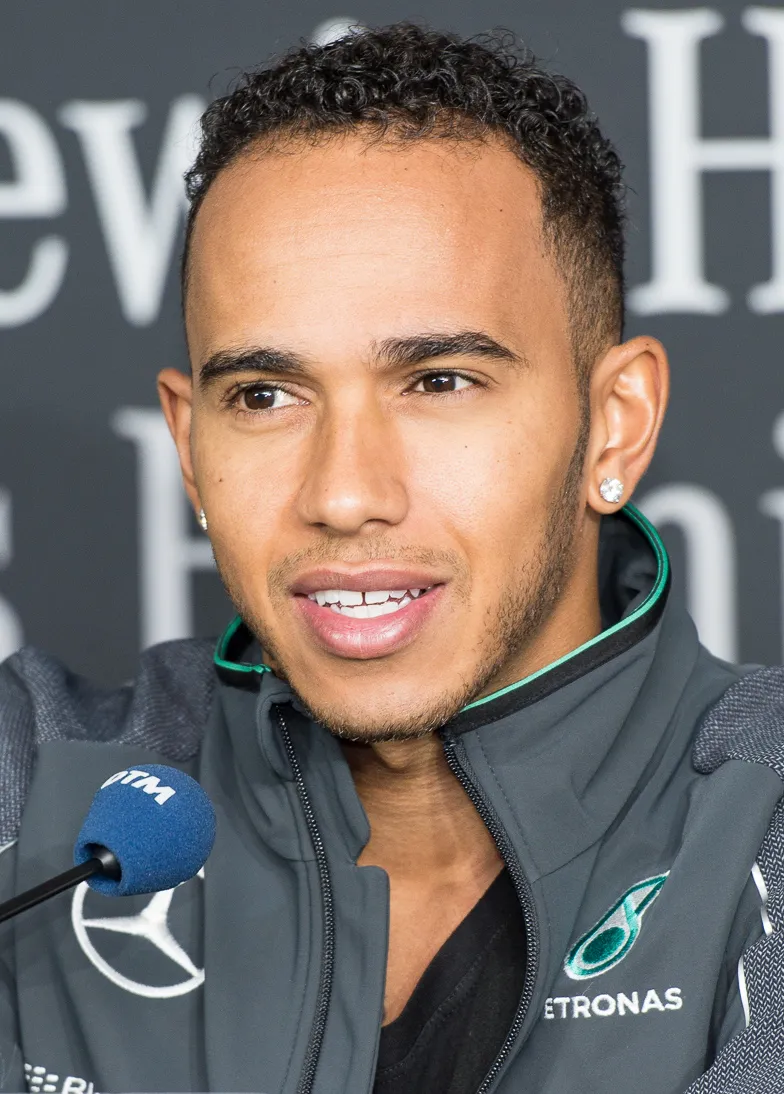 Lewis Hamilton celebrates victory during the dominant Mercedes championship campaign in 2014