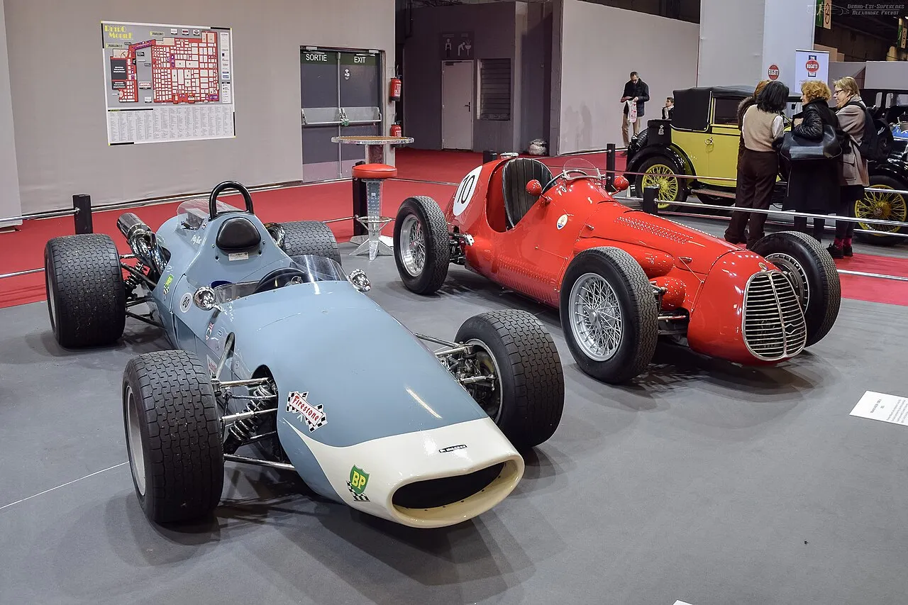 McLaren M3 open-wheel race car displayed in a museum representing its 1965 heritage