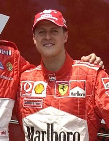 Michael Schumacher celebrates winning his historic sixth title in the 2003 Formula One season