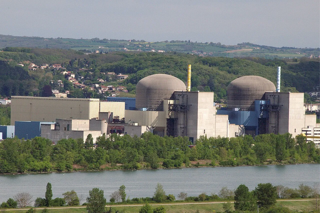Nuclear power plant facilities generate low-carbon electricity globally through fission reactors