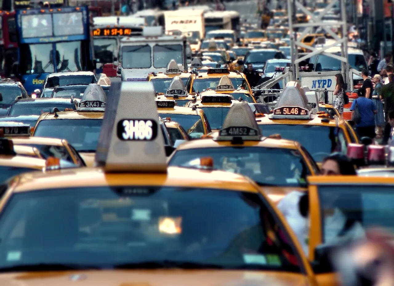 Traffic congestion halts vehicles on a major urban highway during peak morning hours