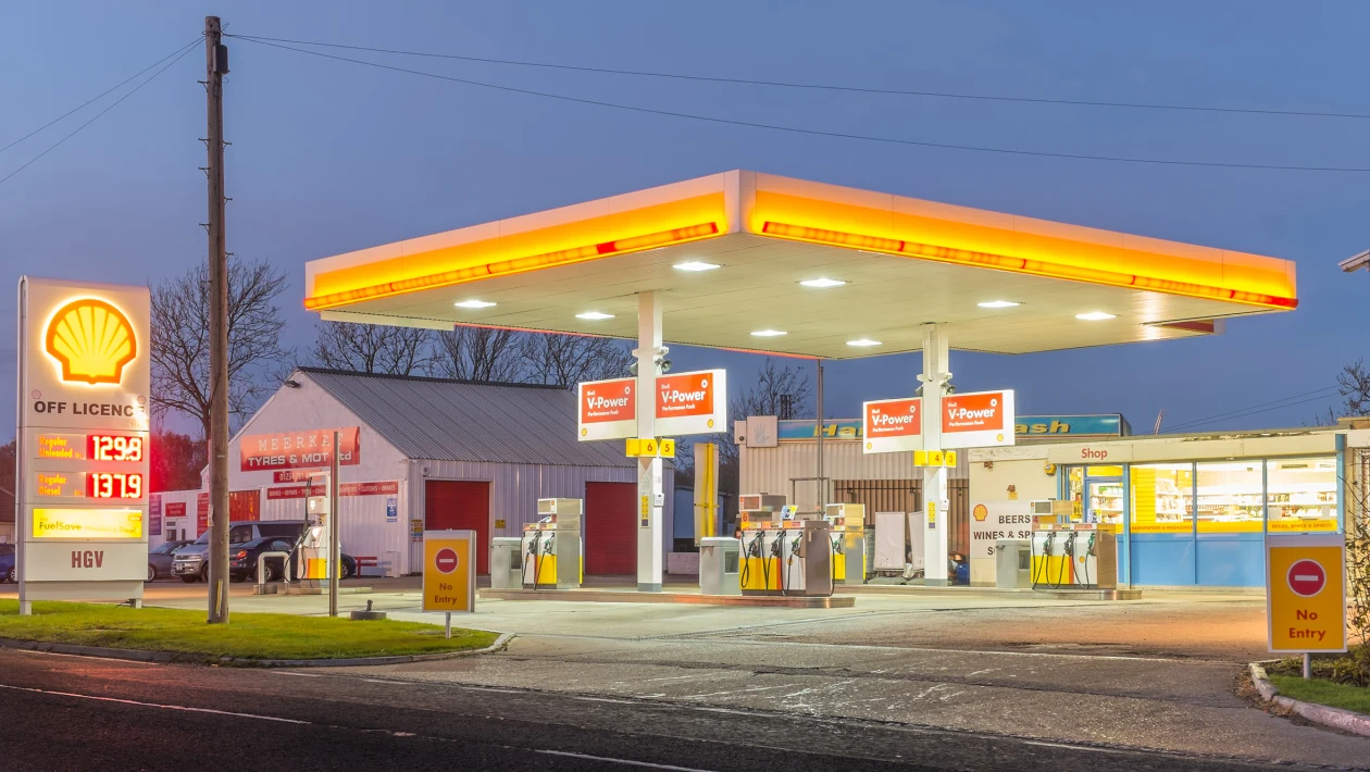 UK motorway services building exterior with parking area and travel facilities