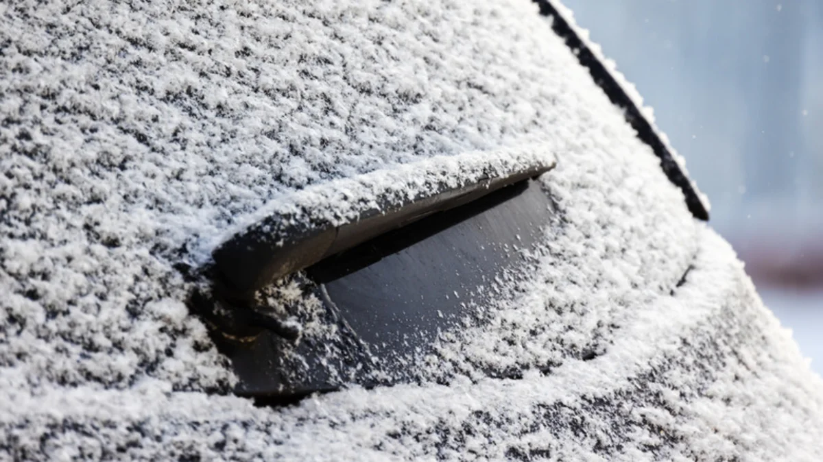 Drivers use plastic bags and tape to protect rear windshield wipers from harsh weather and car washes